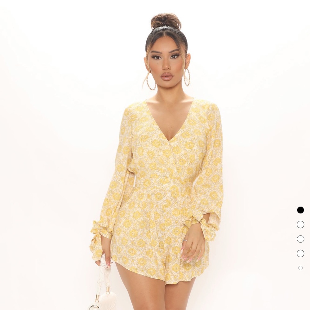Brand new open back romper